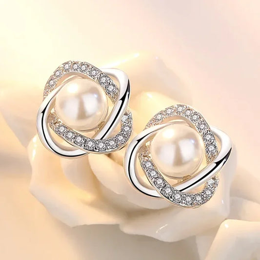 The Luxe Twist Zircon Pearl Stud Earrings in Sterling Silver