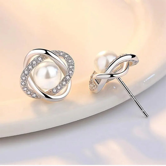 The Luxe Twist Zircon Pearl Stud Earrings in Sterling Silver